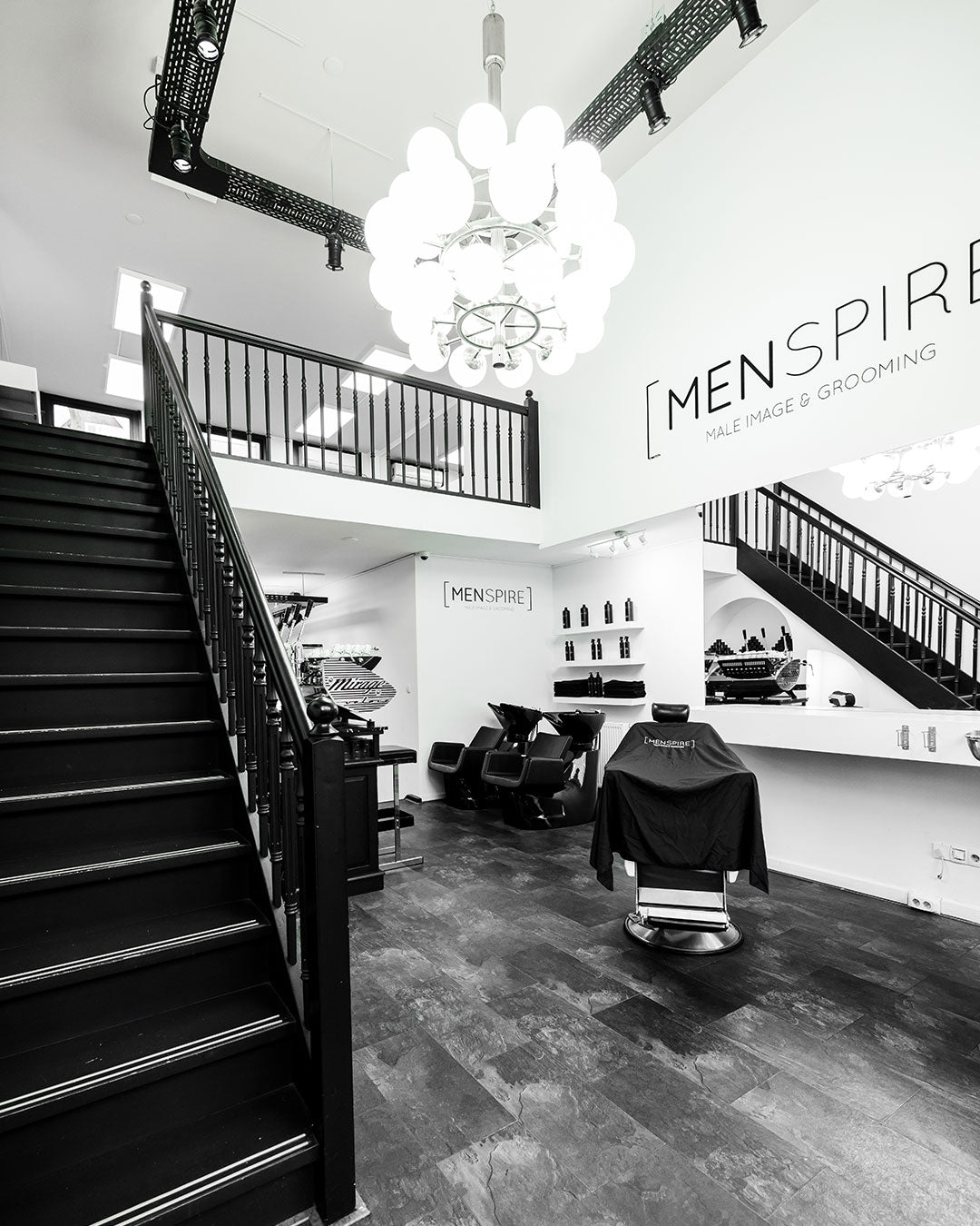 MENSPIRE salon reflecting the brand’s innovative approach to men’s grooming, featuring contemporary design, expert barbers, and a focus on delivering a luxury grooming experience