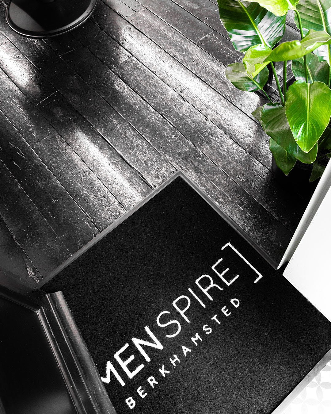MENSPIRE salon reflecting the brand’s innovative approach to men’s grooming, featuring contemporary design, expert barbers, and a focus on delivering a luxury grooming experience