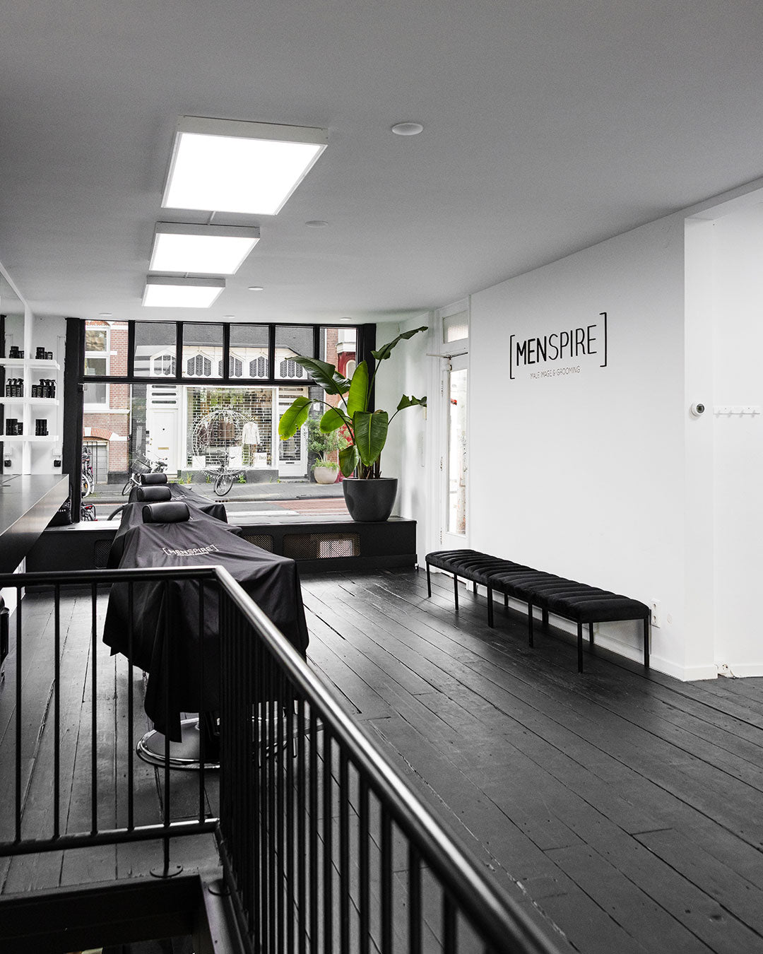 MENSPIRE salon reflecting the brand’s innovative approach to men’s grooming, featuring contemporary design, expert barbers, and a focus on delivering a luxury grooming experience